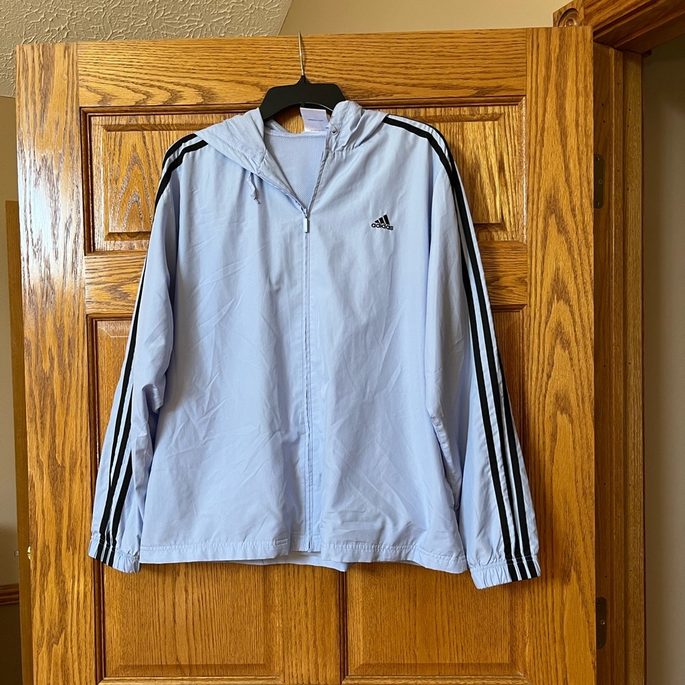 Adidas windbreaker jacket. Light blue/navy blue stripes. Like new. Worn once. XL
